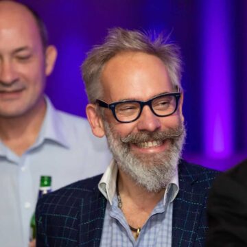 Dominic Frisby smiling at TechAwards event