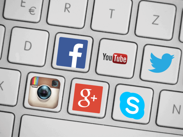 Graphic of keyboard with key social platform logos