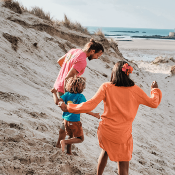 family running on jersey beach
