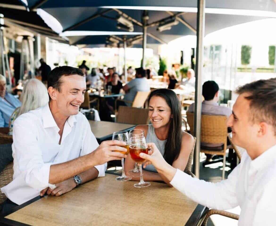 Friends-or-Colleagues-Cheersing-at-YachtRESIZED_-1170x960