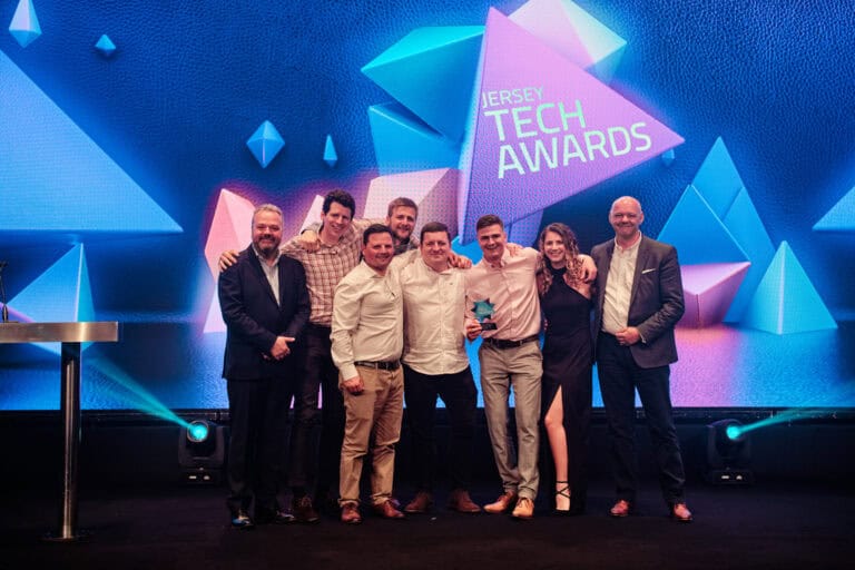 Productivity Award Winners, Channel PC, stood on stage with award and host Hal Cruttenden