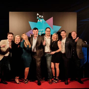 group of people posing for photo at awards