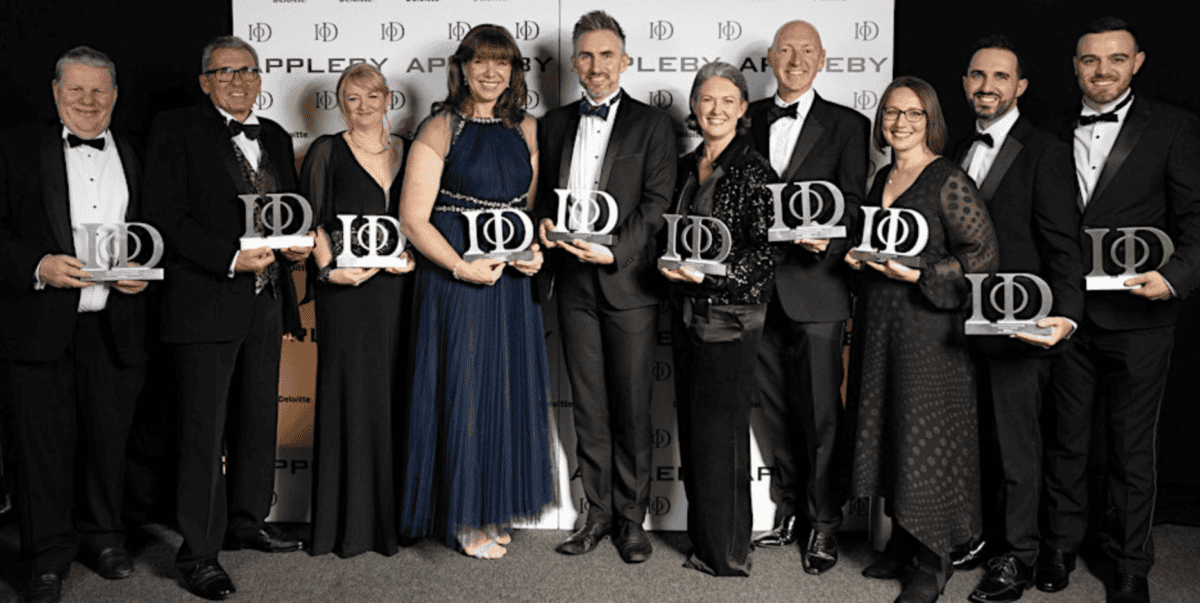 winners of IoD Directors awards dress in Black-tie holding their awards