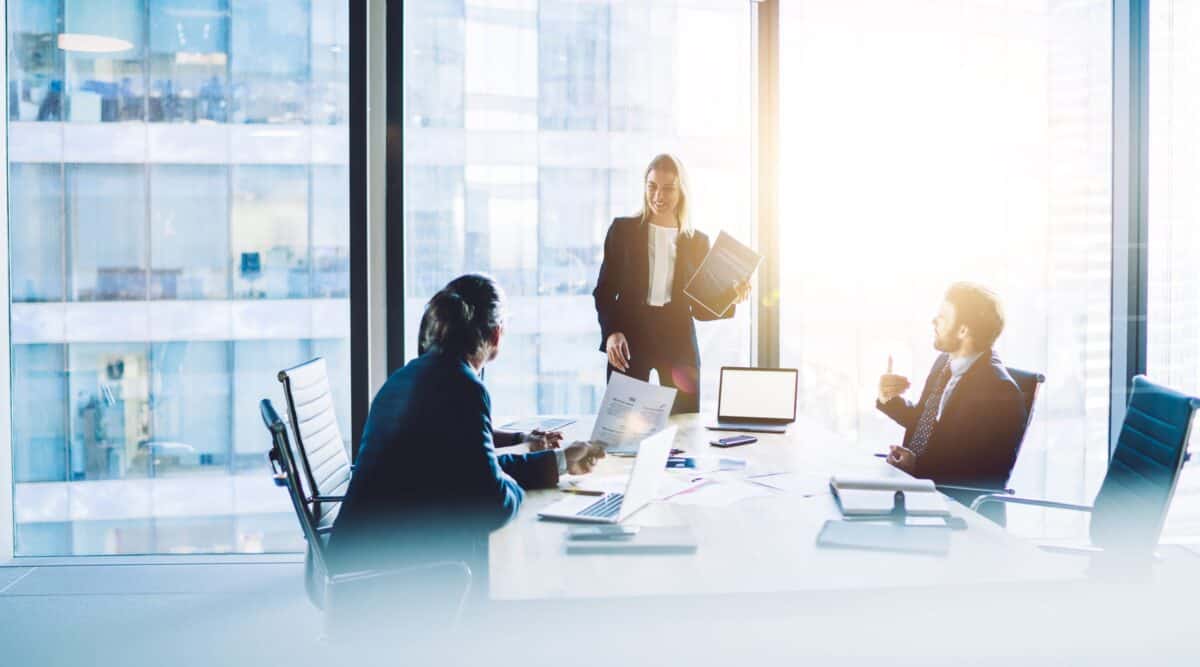Business meeting discussing the use of virtual CISO