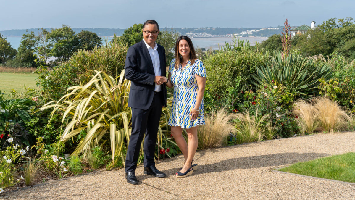 Two people posing outside for Jersey Hospice