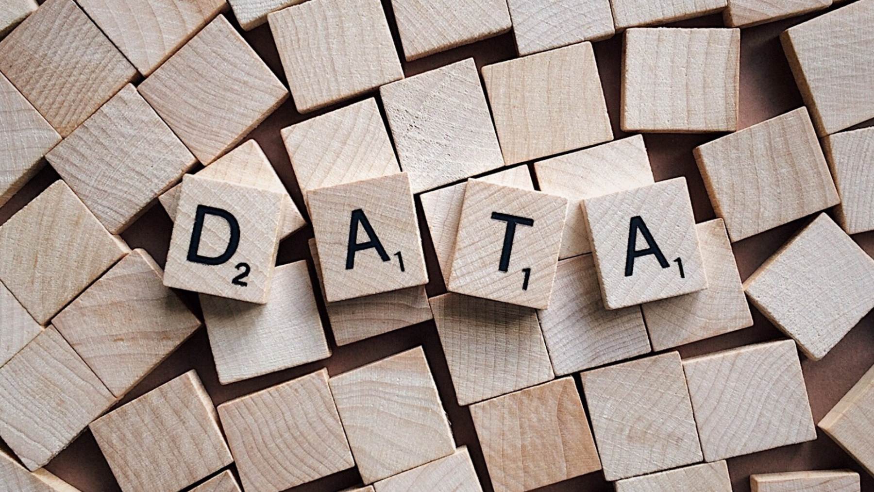 scrabble pieces spelling out the word data