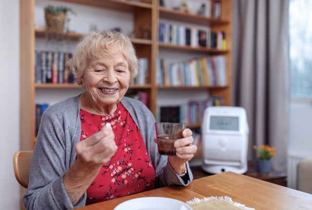 lady taking medication
